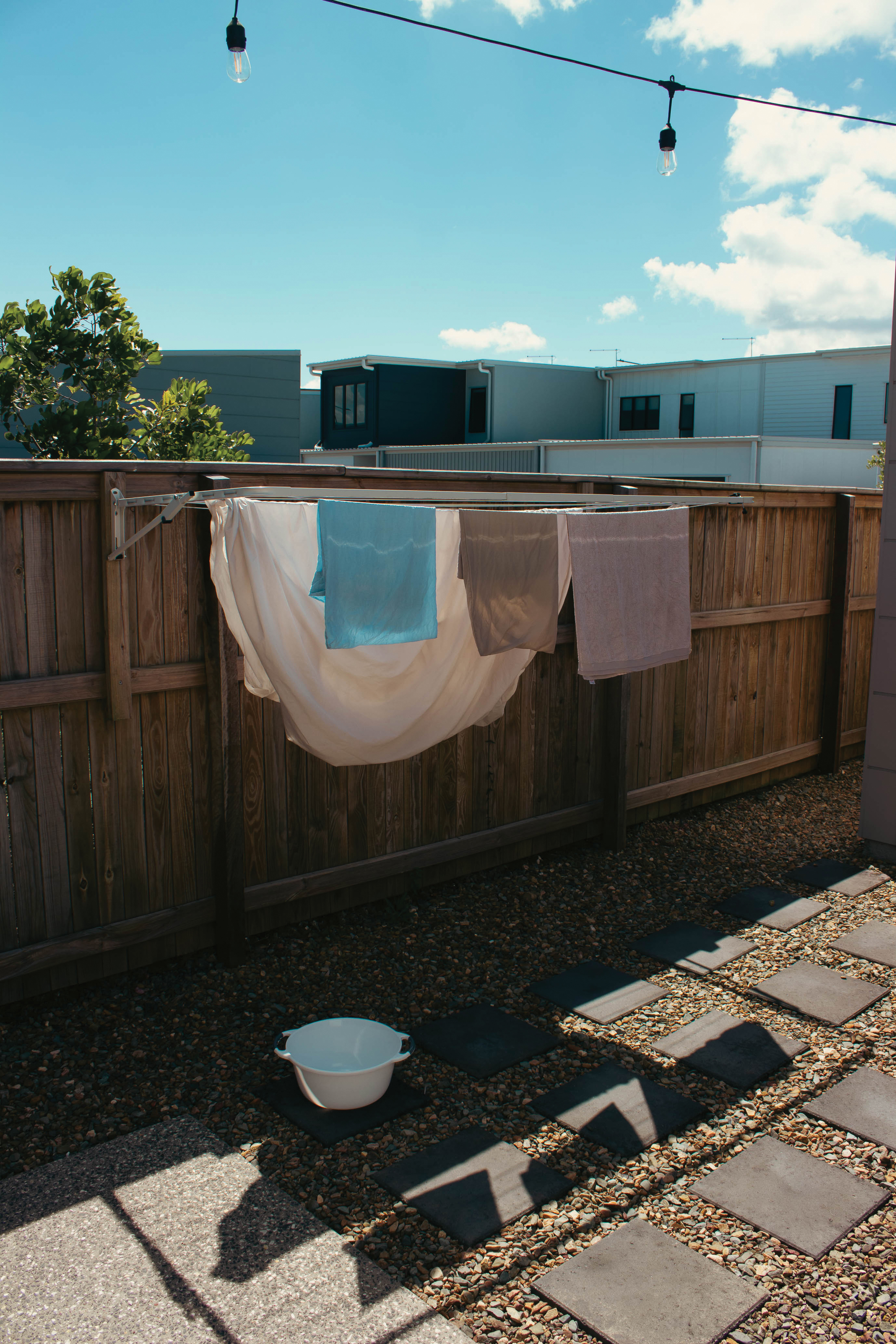 A washing line in a backyard at golden hour