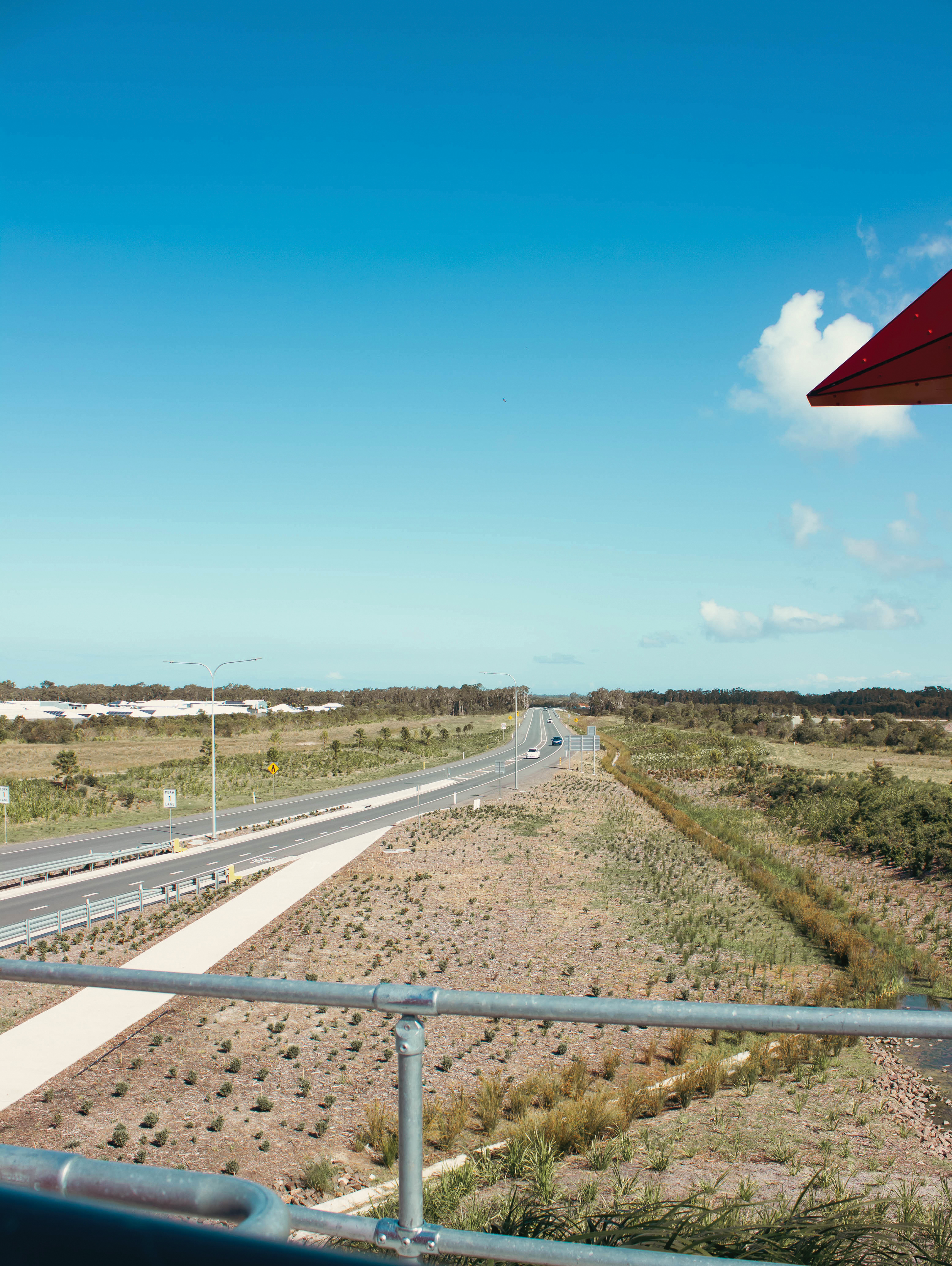 A long road leading to the high-way